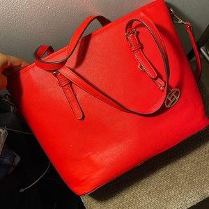 Red tote/crossbody bag.